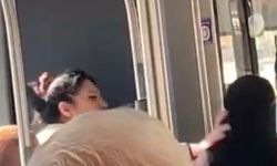 Halk otobüsünde tesettürlü kadına hakaret eden kadı gözaltına alındı