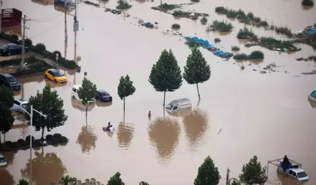 Çin'de gerçekleşen sel felaketinin bilançosu artıyor! Hayatını kaybedenlerin sayısı 20'yi buldu